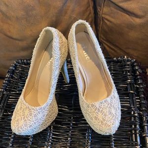 Cream and silver lace 6” platform stilettos.